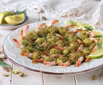 Gambas al horno en costra de pistachos