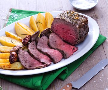 Rosbif al horno con champiñones y patatas
