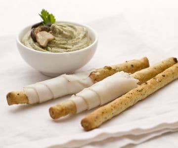 Palitos de aceitunas con boletus y panceta