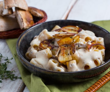 Pasta con crema de Parmigiano y setas porcini