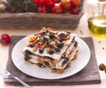 Lasaña con ragú de conejo y setas