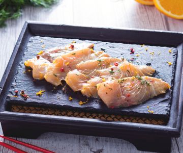 Carpaccio de lecha marinado en salsa de soja