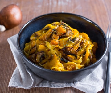 Pasta con calabaza y champiñones