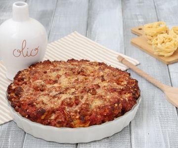 Nidos de tallarines con ragú de salchicha