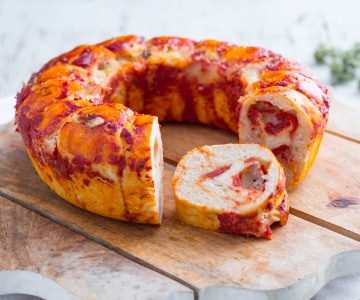 Rosca de pizza alta y esponjosa