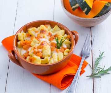 Ñoquis gratinados con calabaza y toma