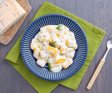Ñoquis de calabaza con salsa de taleggio