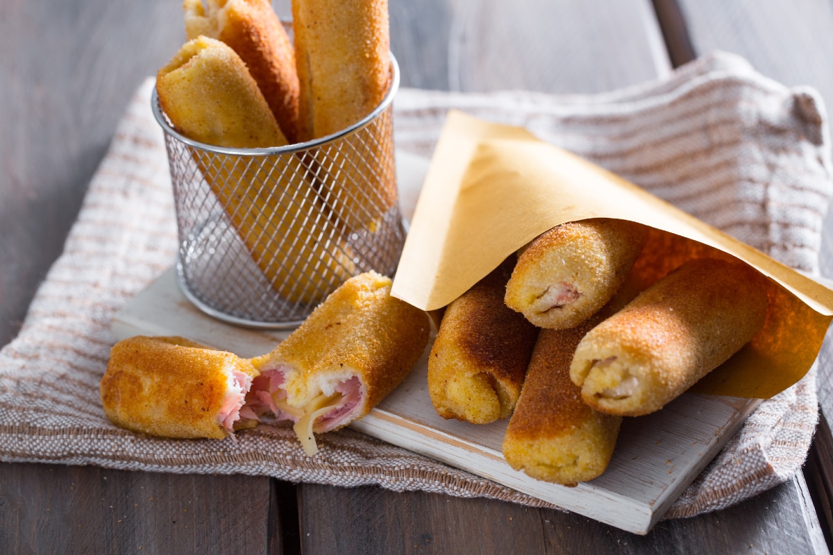 Rollitos de pan de molde jamón y queso