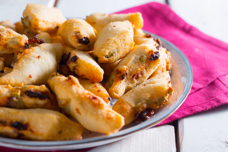 Trozos de pizza fritos