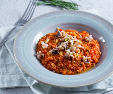 Risotto sepia y tomate
