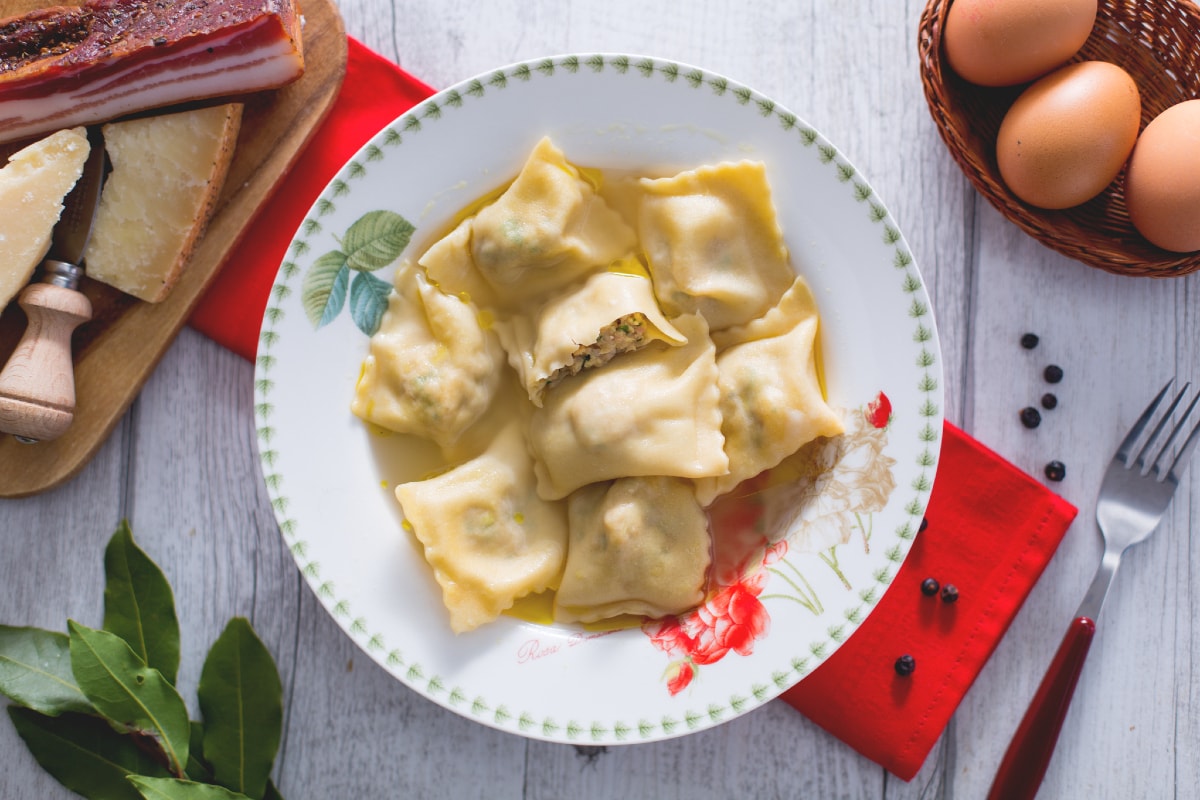 Ravioles con caldo de capón