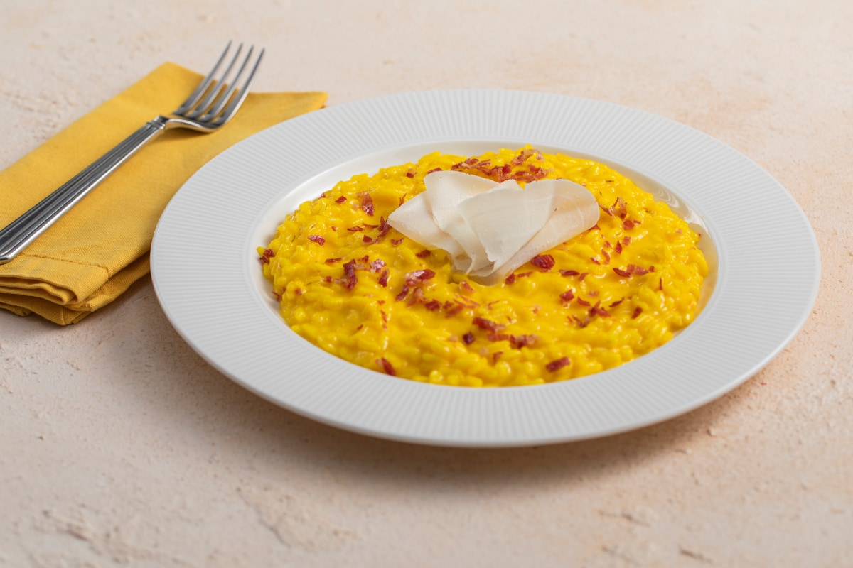 Risotto al azafrán con taleggio y panceta