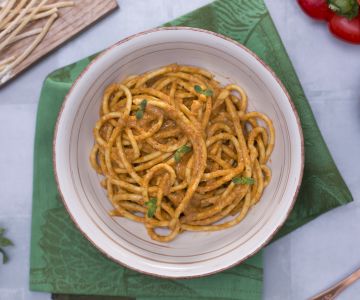 Bigoli en salsa de pimientos rojos