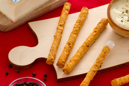 Sfilati con fonduta al pepe nero