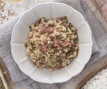 Risotto con cotechino, lentejas y champán