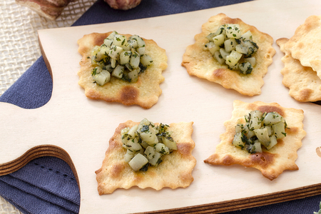 Hojaldres con topinambur salteados