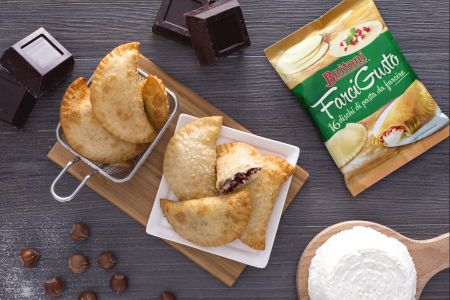 Panzerotti con ricotta, chocolate y granillo de avellanas