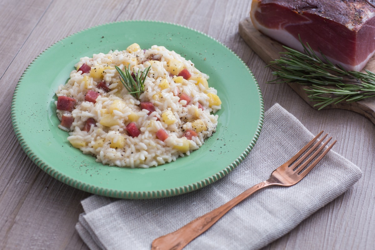 Risotto con manzanas y speck