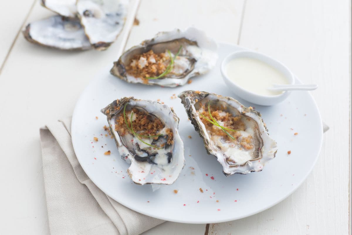 Ostras con cava y cebolleta