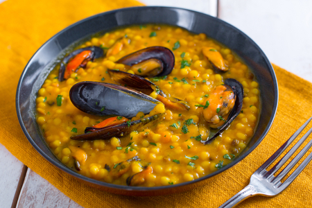 Fregola con calabaza y mejillones