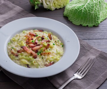 Risotto con col, speck y fontina