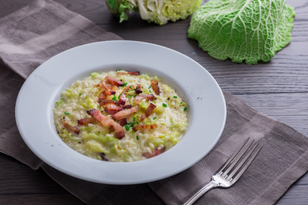 Risotto con col, speck y fontina