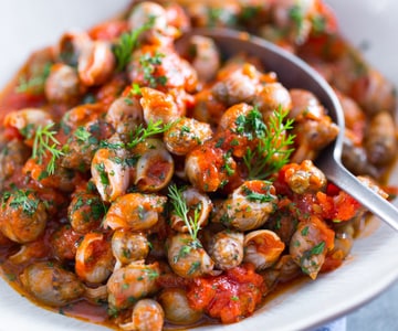 Caracoles de mar guisados