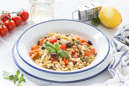 Fregola con bacalao
