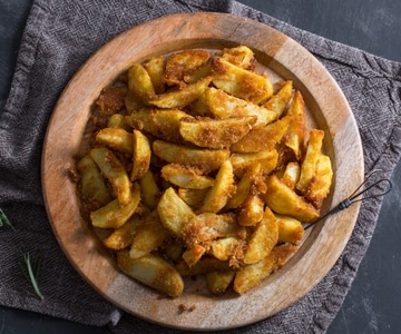 Patatas crujientes con queso