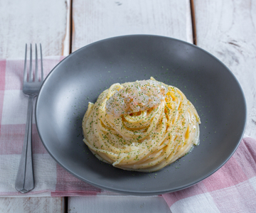 Espaguetis con limón asado y cigalas