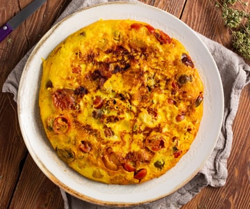 Tortilla con tomatitos y pecorino