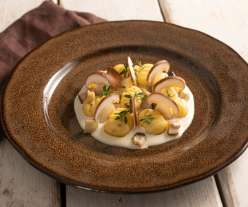 Ñoquis con setas y provola