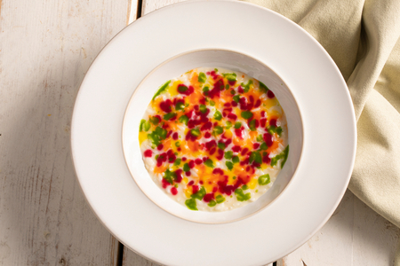 Risotto cremoso con caponata siciliana