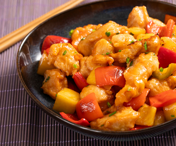 Pollo en salsa agridulce con pimientos y piña
