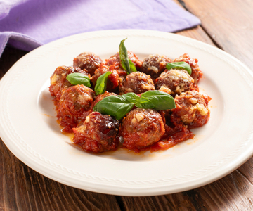 Albóndigas gratinadas en salsa de tomate