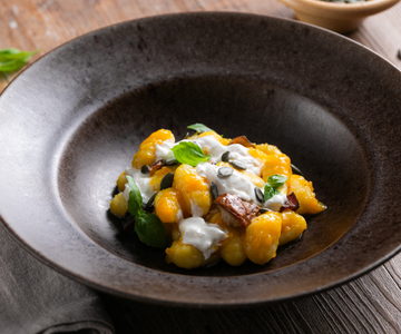 Gnocchi de calabaza con boletus y burrata