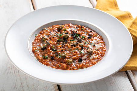 Risotto a la puttanesca con tomates asados