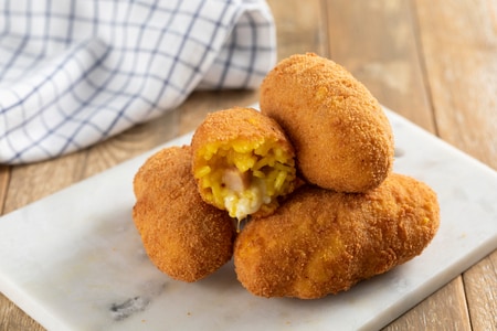 Croquetas de arroz con provola y jamón cocido