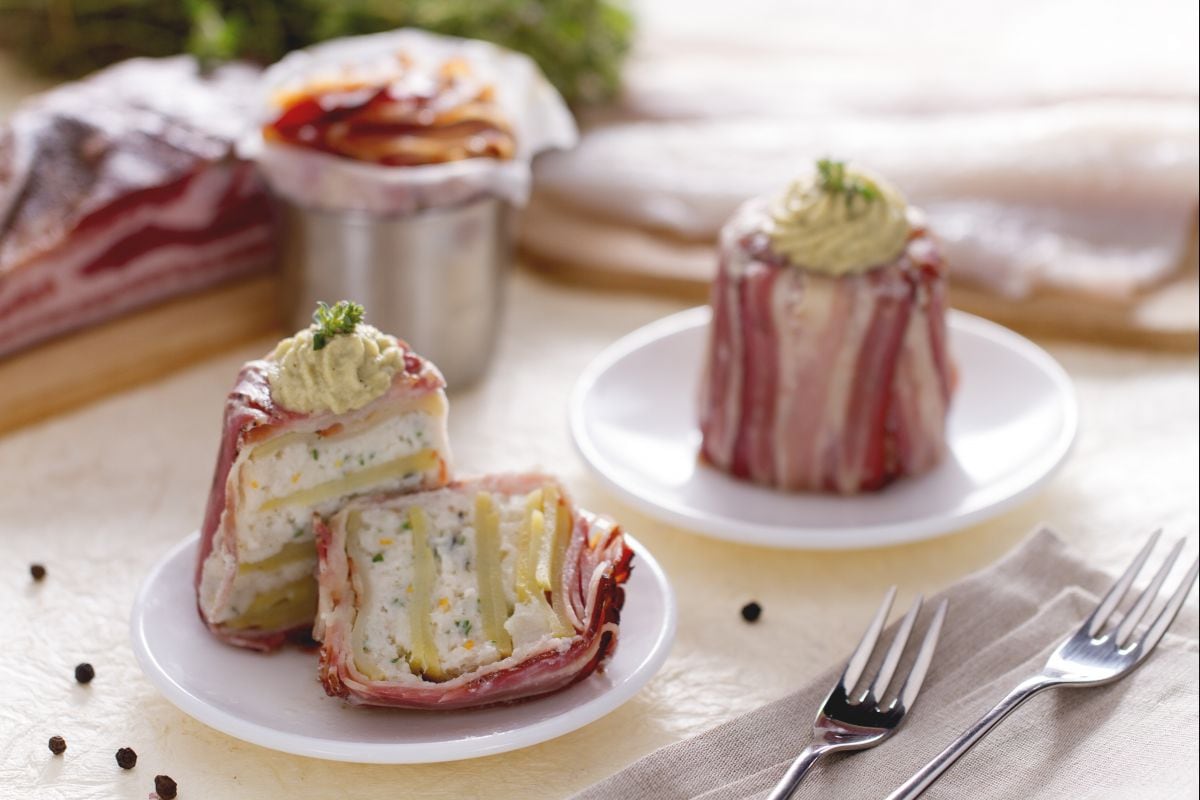 Flan de bacalao sobre crema de alcachofas